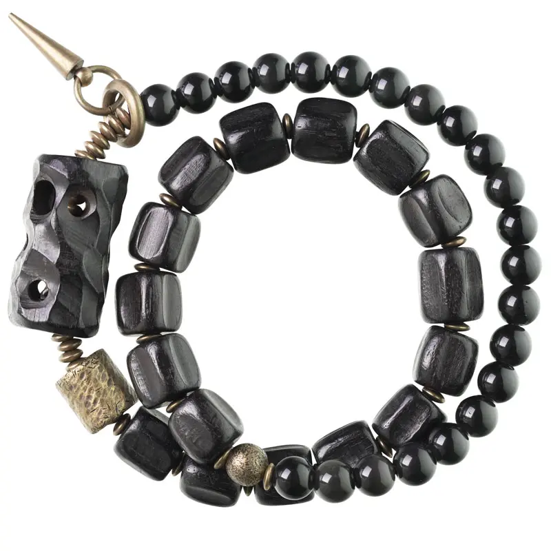The Guardian's Path A Carved Ebony And Onyx Bracelet