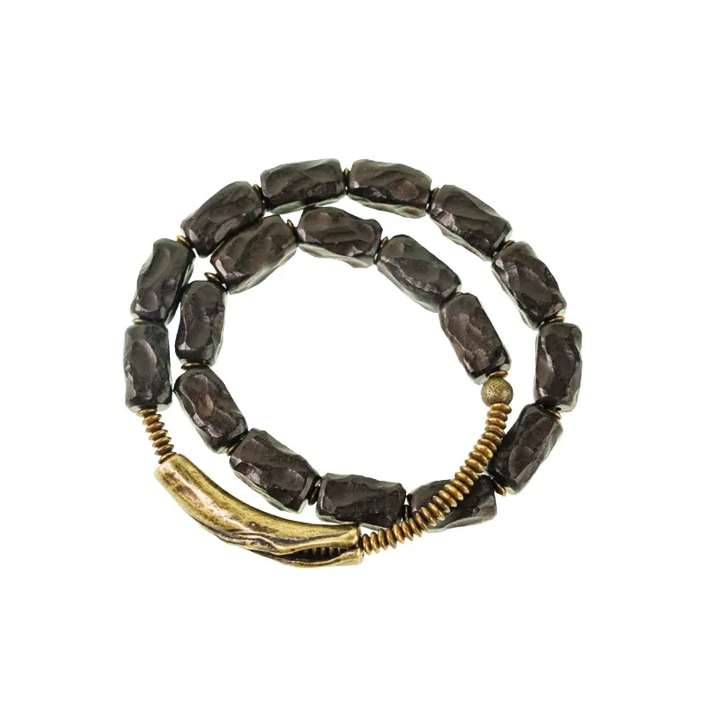 The River Stone Path A Carved Ebony Brass Bracelet