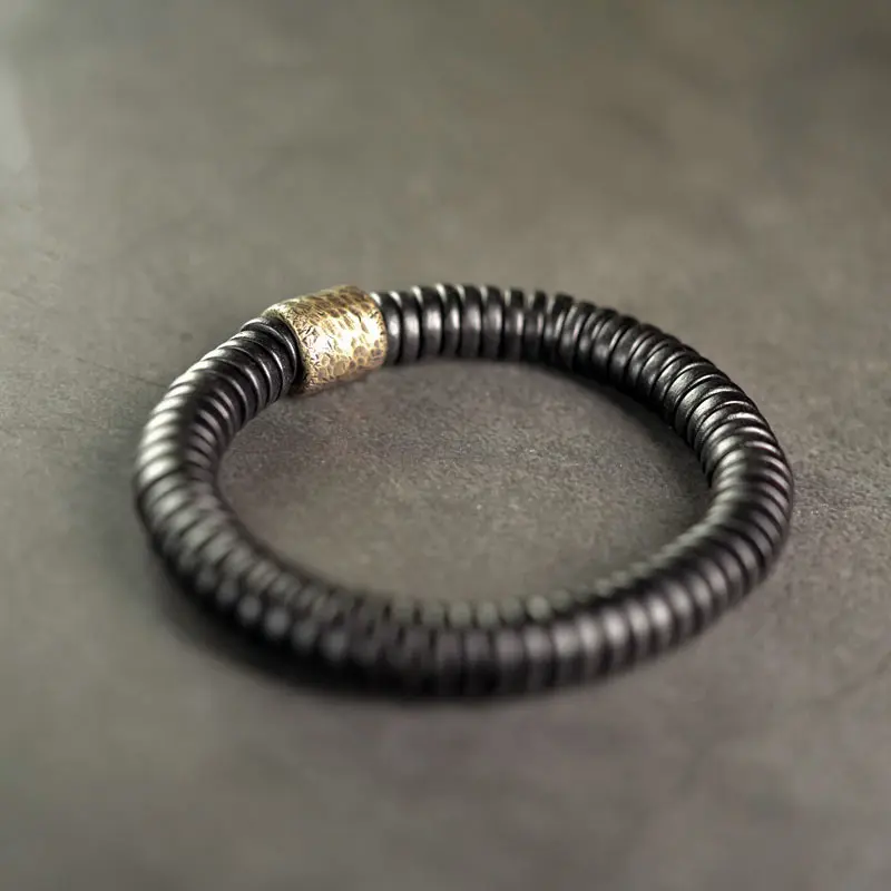 The Ultimate Serene Path: A Hammered Brass Ebony Bracelet