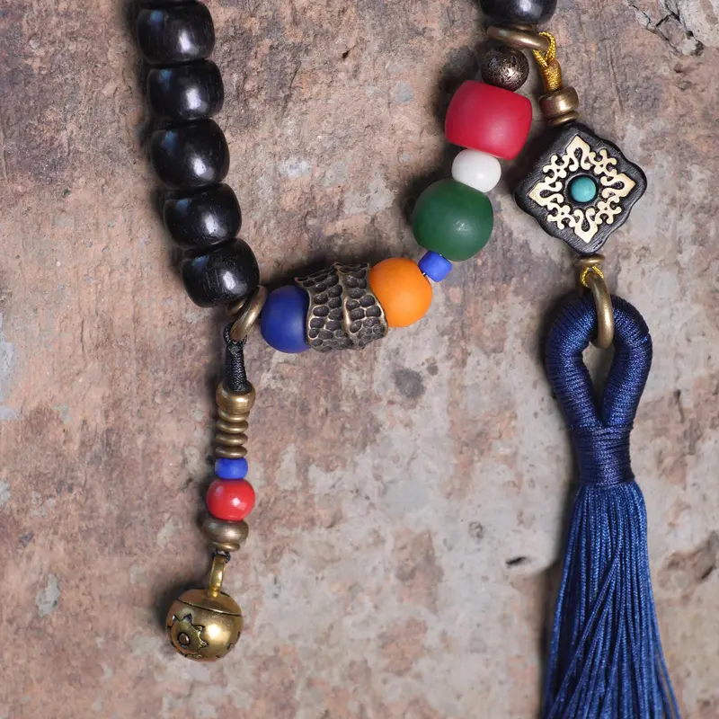 Tibetan Dzi Bead Mala Ebony Wood Tassel Bracelet