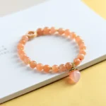 Natural Sunstone Bracelet with Peach Charm - Handcrafted Vitality Jewelry