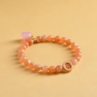 Natural Sunstone Bracelet with Peach Charm - Handcrafted Vitality Jewelry
