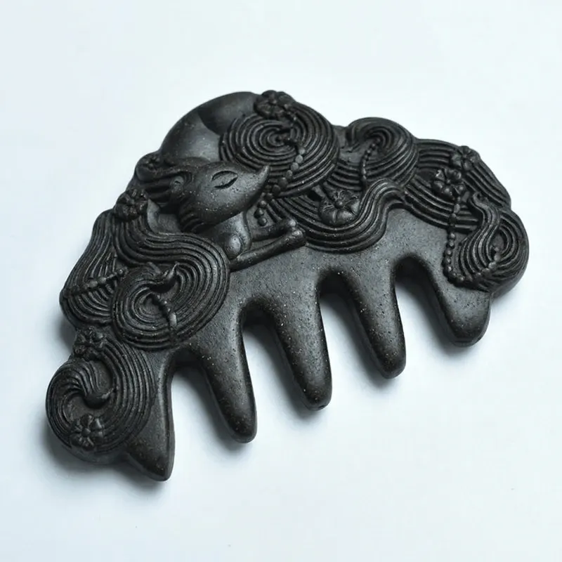 black-carved-fox-massage-comb