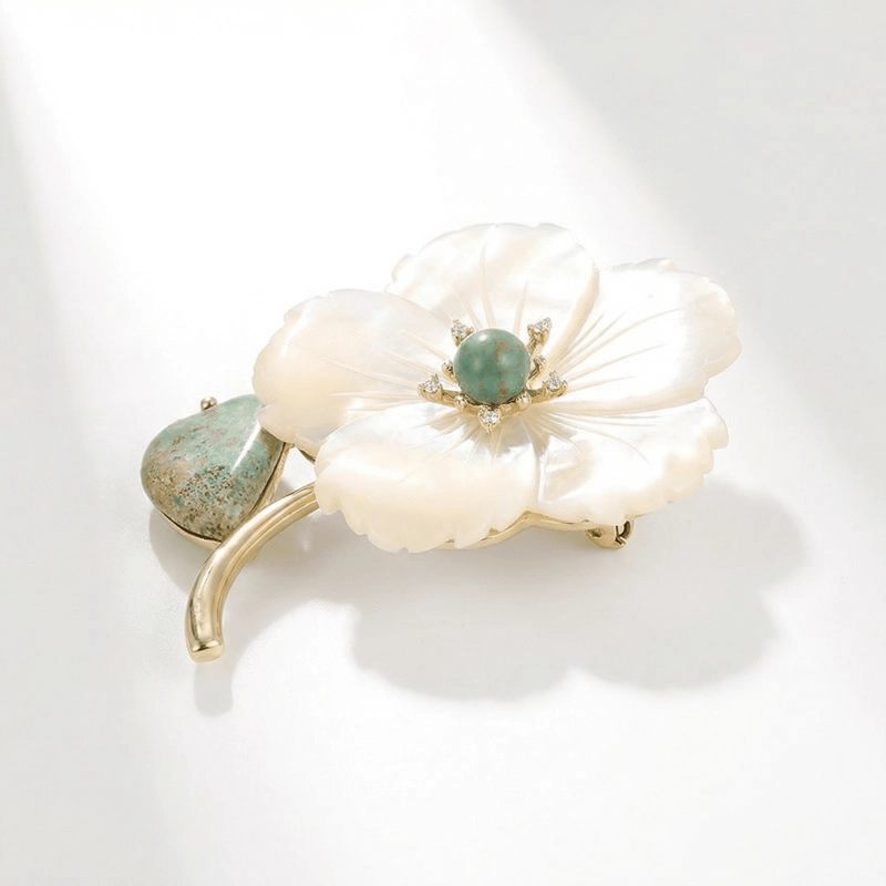 mother-of-pearl-flower-brooch-with-turquoise-leaf